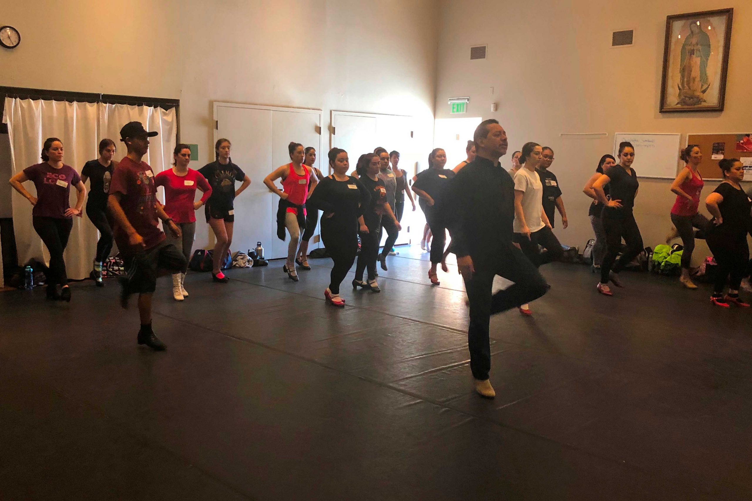 Photo of Maestro Silvestre Garcia leading artist exchange workshop in 2018